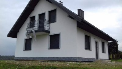 DOCIEPLENIA I ELEWACJE